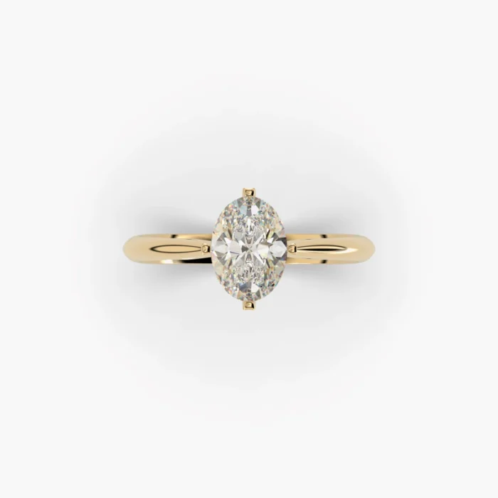 18kt yellow gold solitaire ring with oval cut diamond