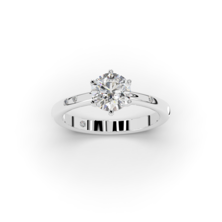 Solitario de oro blanco con diamante central y 4 brillantes